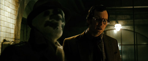 Dan Dreiberg se reune con Rorschach y se pregutan ¿para quién trabajaba Eddie?